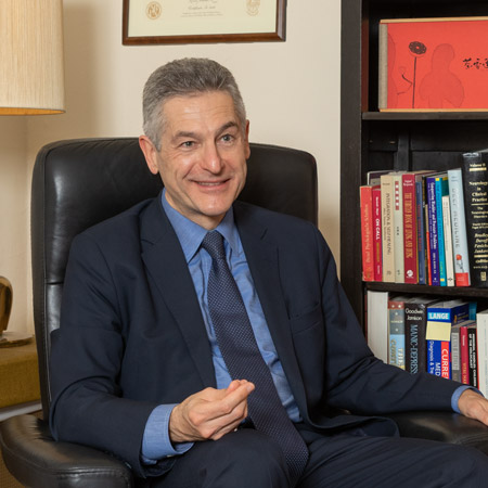 Maurice Preter, MD Psychiatrist And Neurologist Seated In His Office